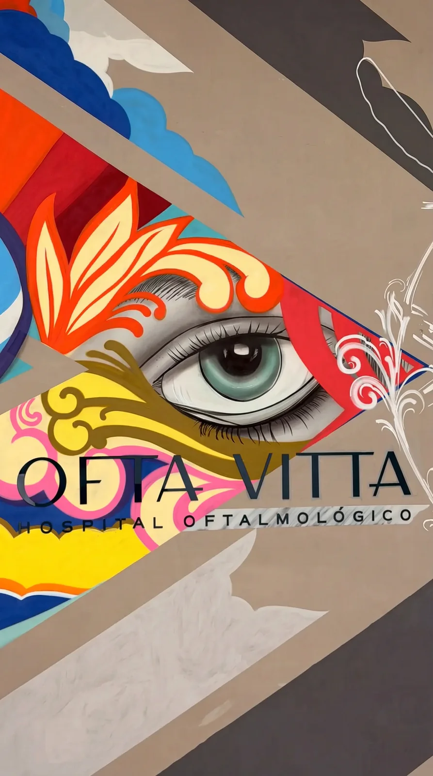 Mural artístico OFTA VITTA, olho estilizado com identidade visual do hospital oftalmológico de Umuarama